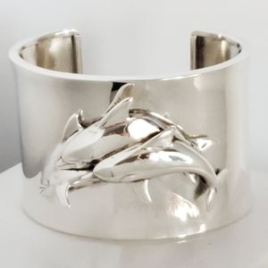 Sterling silver dolphin motif cuff bracelet
